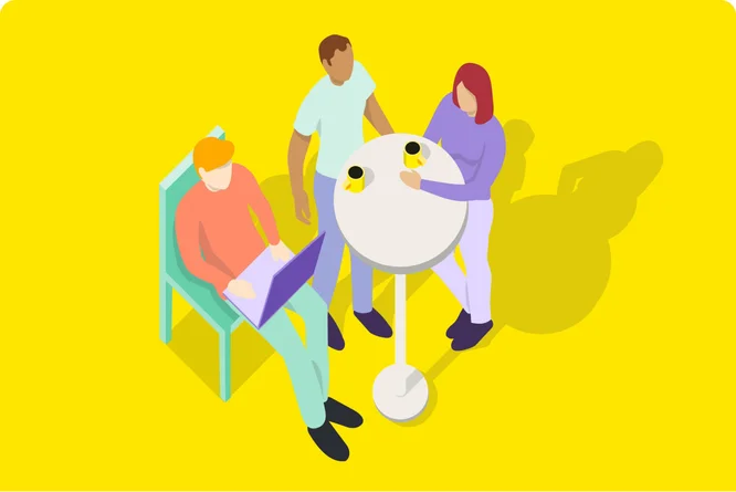 A group of individuals sitting around a table, engrossed in work, with a laptop and a cup of coffee, creating a productive work atmosphere.