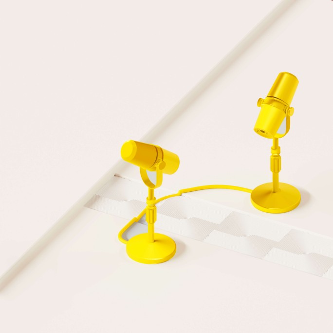 Two bright yellow microphones are positioned on a clean, abstract white surface with geometric cutouts. The microphones are modern and stylized, standing on circular bases with visible cables. The scene is brightly lit, emphasizing the playful and creative mood with a monochromatic yellow palette. No visible text or numbers are present in the image.